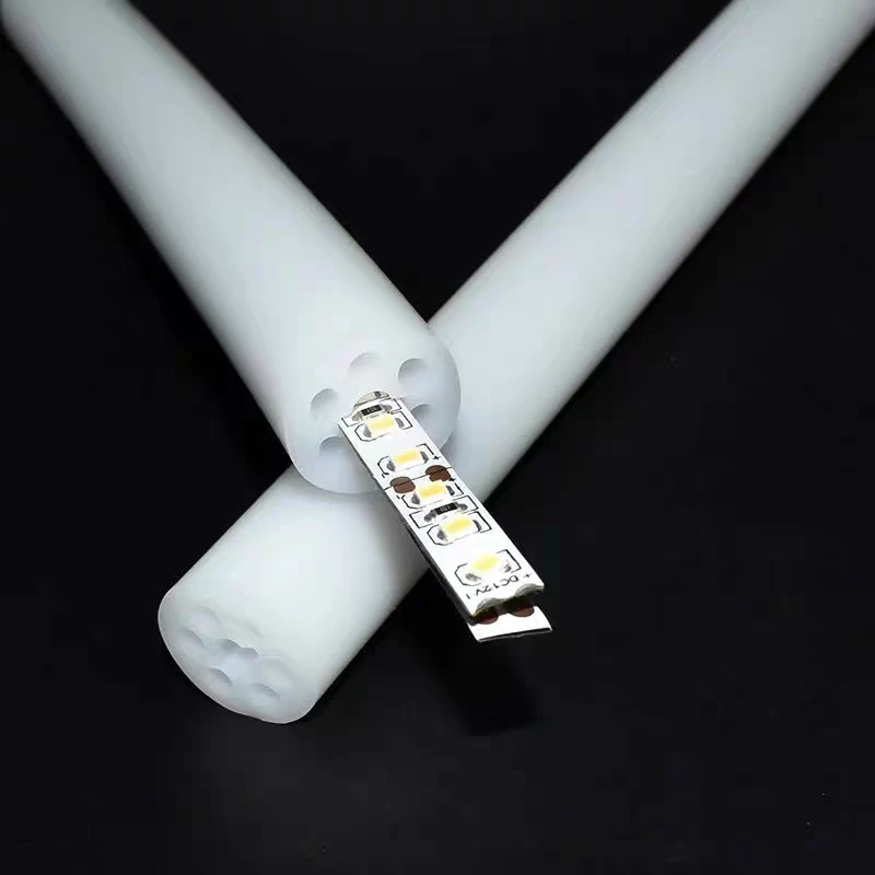 Empty silicone tube cross-section with a separate LED strip partially inserted